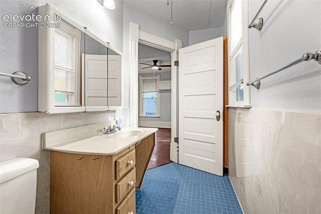 Image 10 of 50: Main level bathroom
