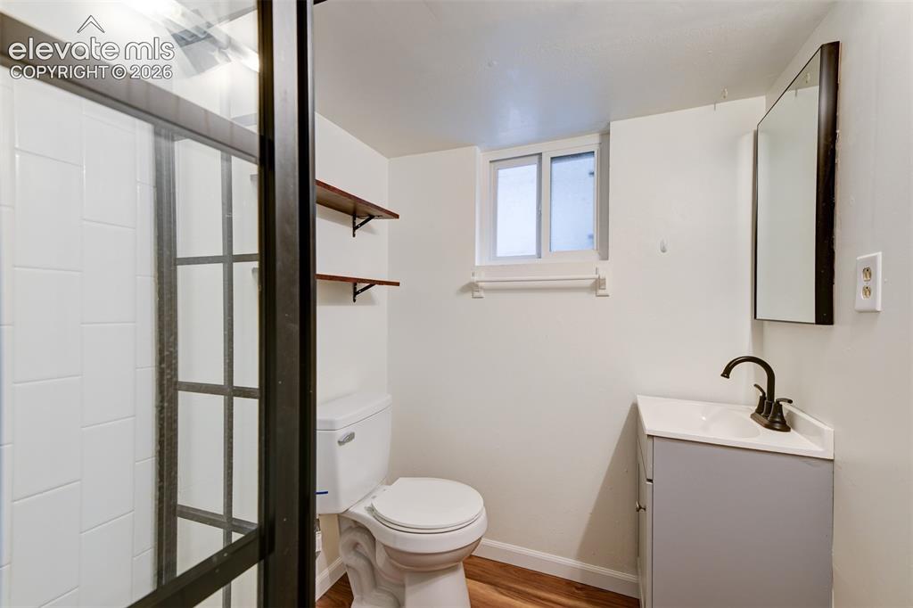 Image 12 of 50: Basement unit located in the back of the property 