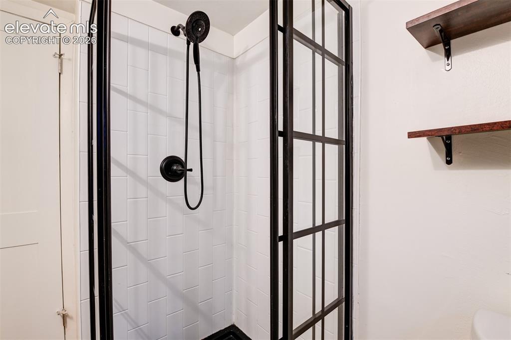 Image 13 of 50: Basement unit located in the back of the property 
