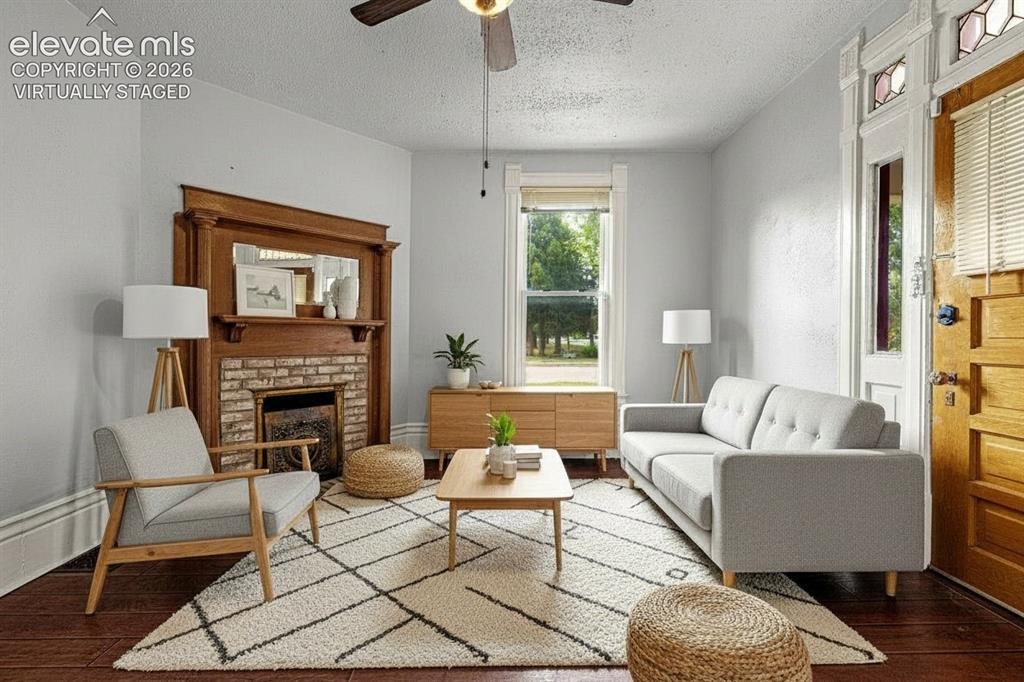 Image 16 of 50: main level living room, virtually staged 
