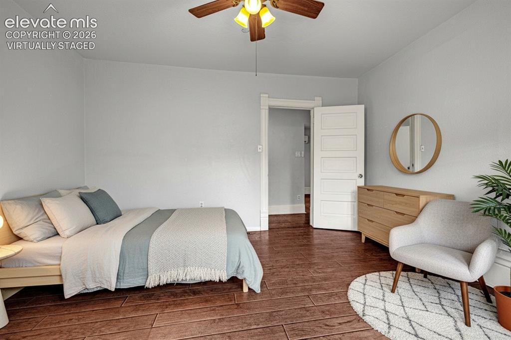 Image 17 of 50: main level bedroom, virtually staged