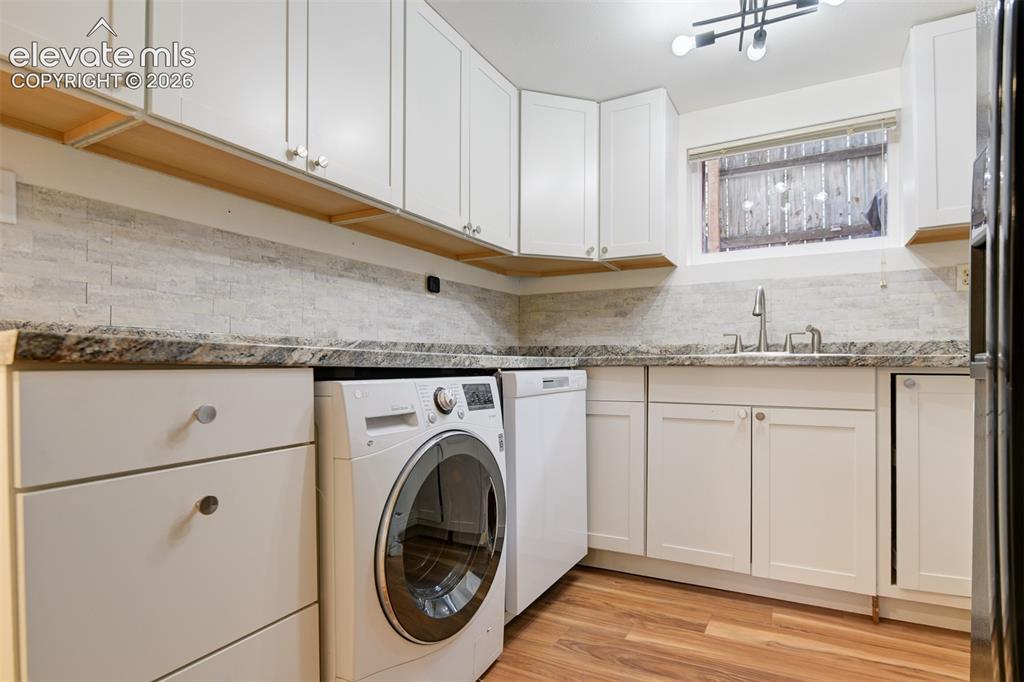 Image 21 of 50: Basement unit located in the back of the property