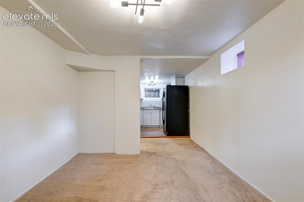 Image 34 of 50: Basement unit located in the back of the property 