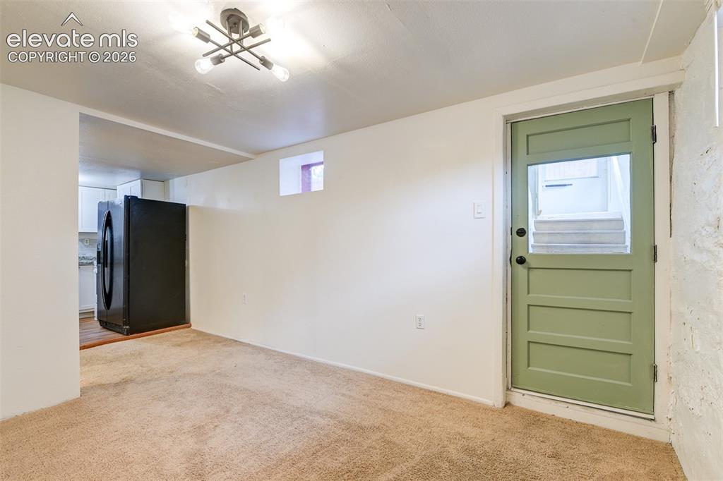 Image 35 of 50: Basement unit located in the back of the property 