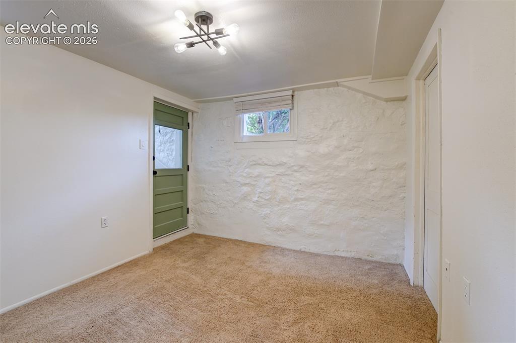 Image 36 of 50: Basement unit located in the back of the property 