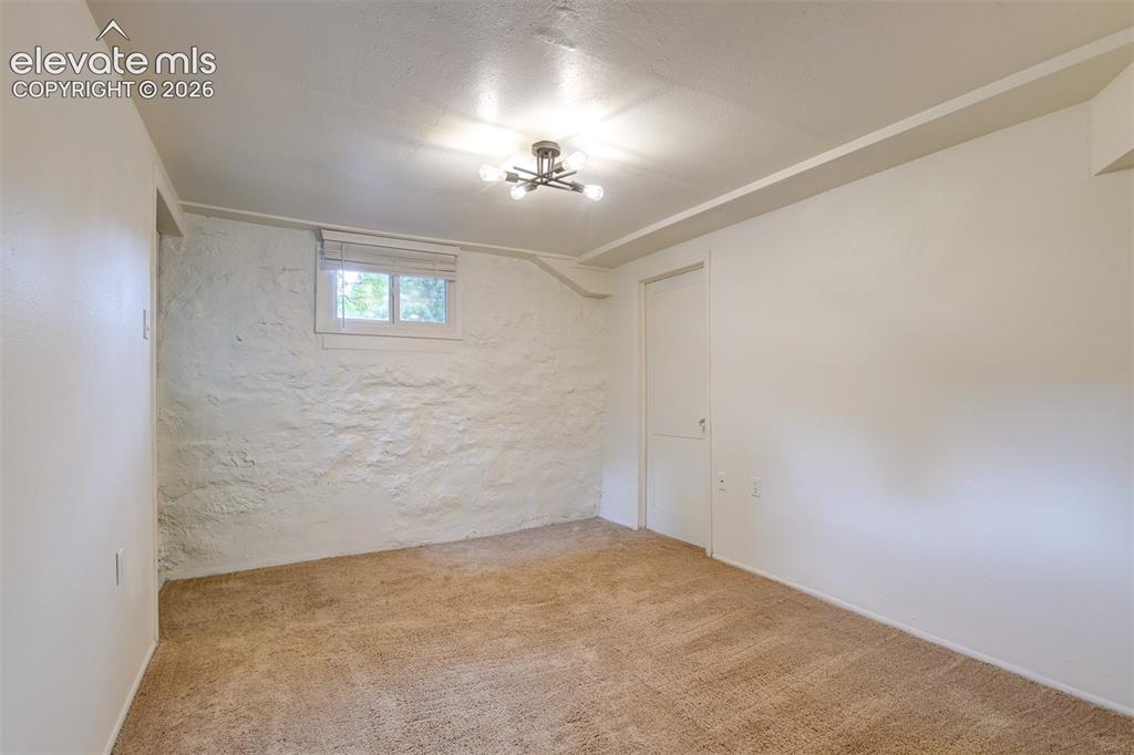 Image 37 of 50: Basement unit located in the back of the property 