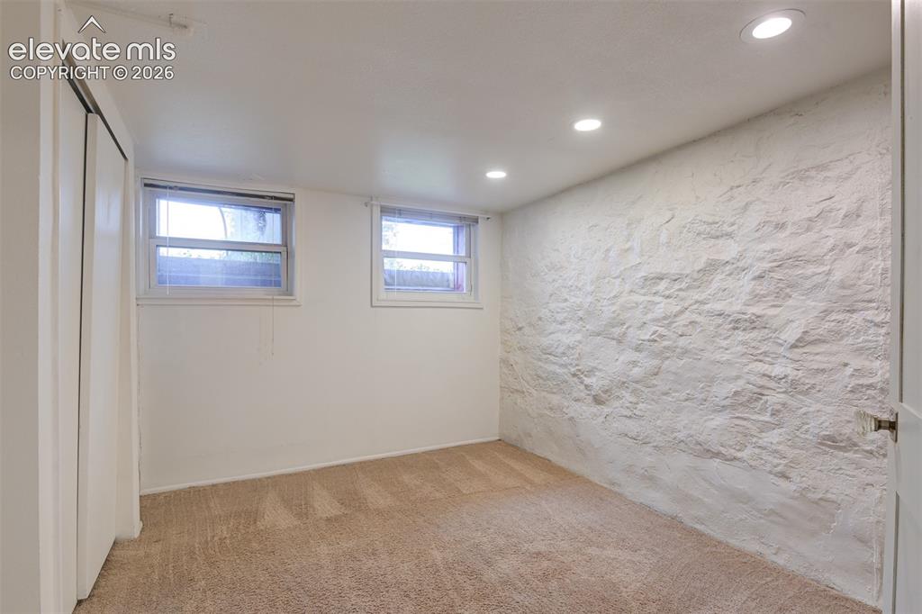 Image 38 of 50: Basement unit located in the back of the property