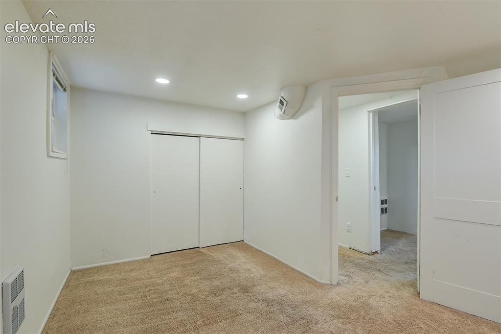 Image 42 of 50: Basement unit located in the back of the property 
