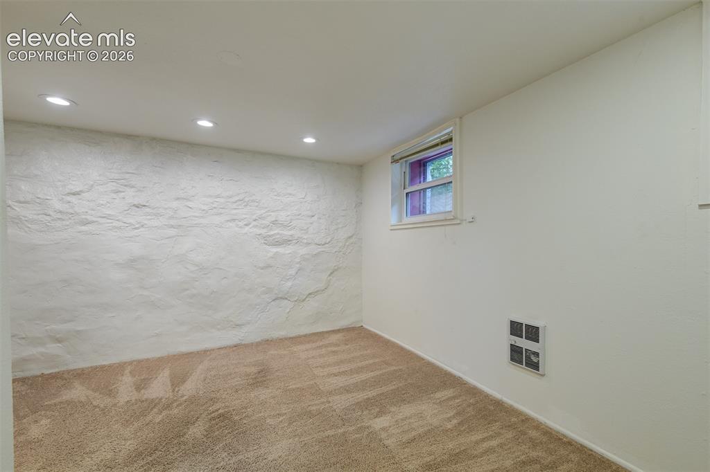 Image 43 of 50: Basement unit located in the back of the property 