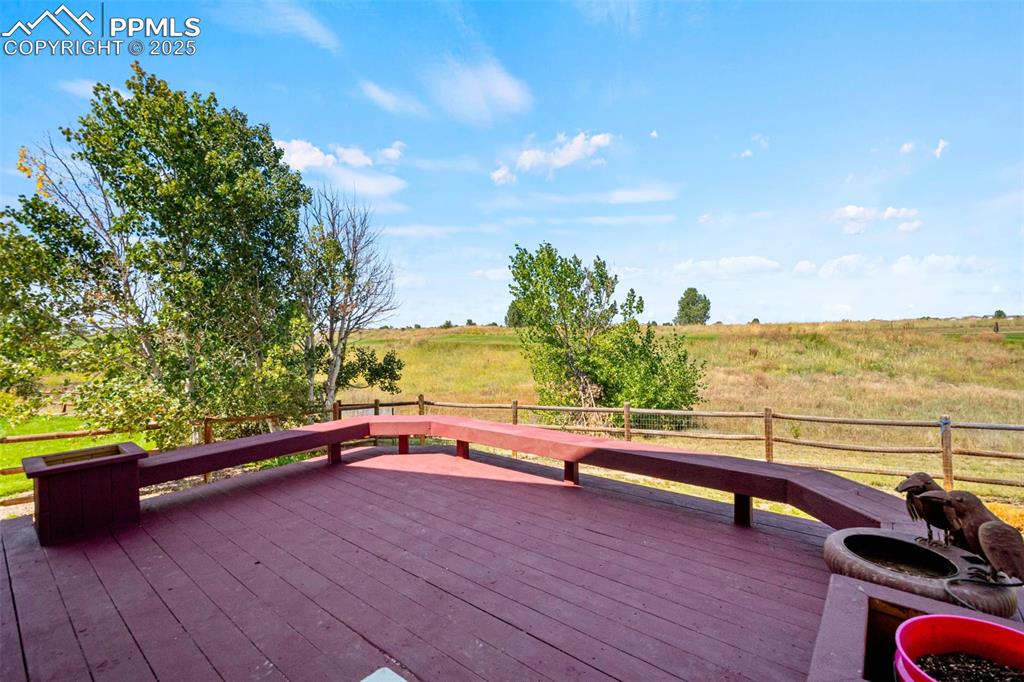 Image 32 of 39: Wooden deck featuring a view of countryside