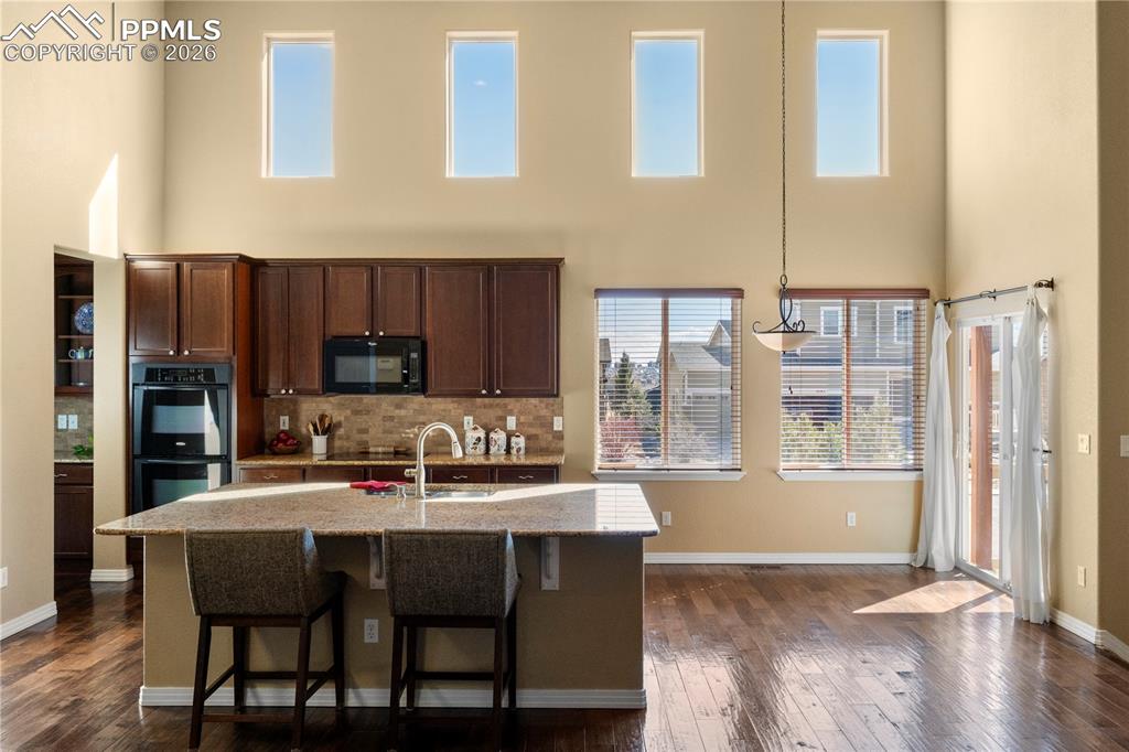 Image 11 of 43: Plenty of room for additional dining space.  