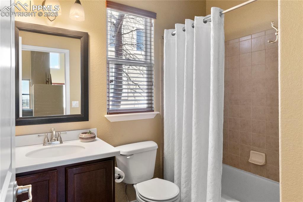 Image 16 of 43: Main level full bath. 