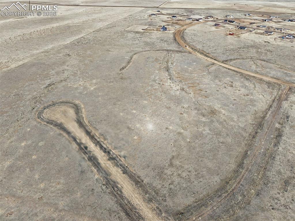 Image 8 of 13: Aerial Property Boundaries – Overhead perspective illustrating the lot’s sh