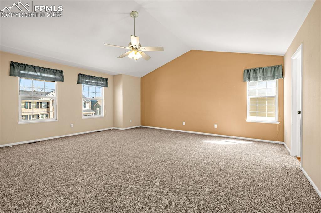 Image 14 of 39: This is how a master bedroom looks - with room for sitting area, extra dres