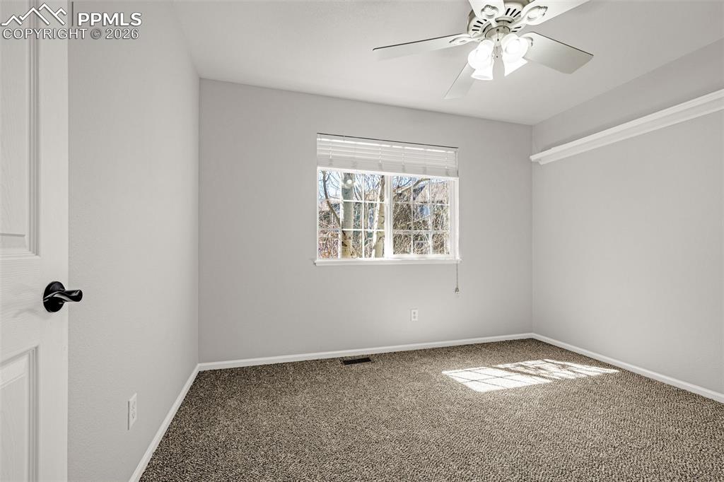 Image 19 of 39: Bright paned windows allow natural lightling to flow in