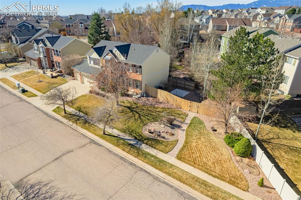 Image 34 of 39: Well established landscaping adds to the beauty of this home