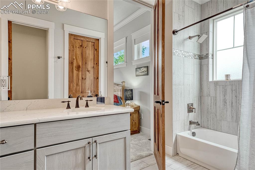 Image 37 of 50:  Shower, bath, Tub, Vanity