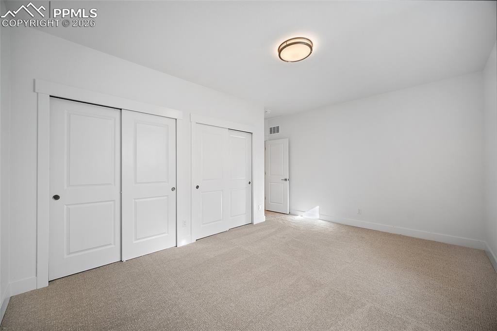 Image 32 of 39: Bedroom