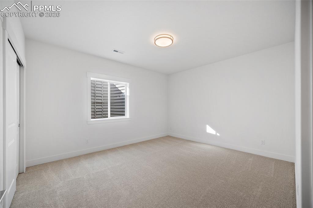 Image 34 of 39: Bedroom