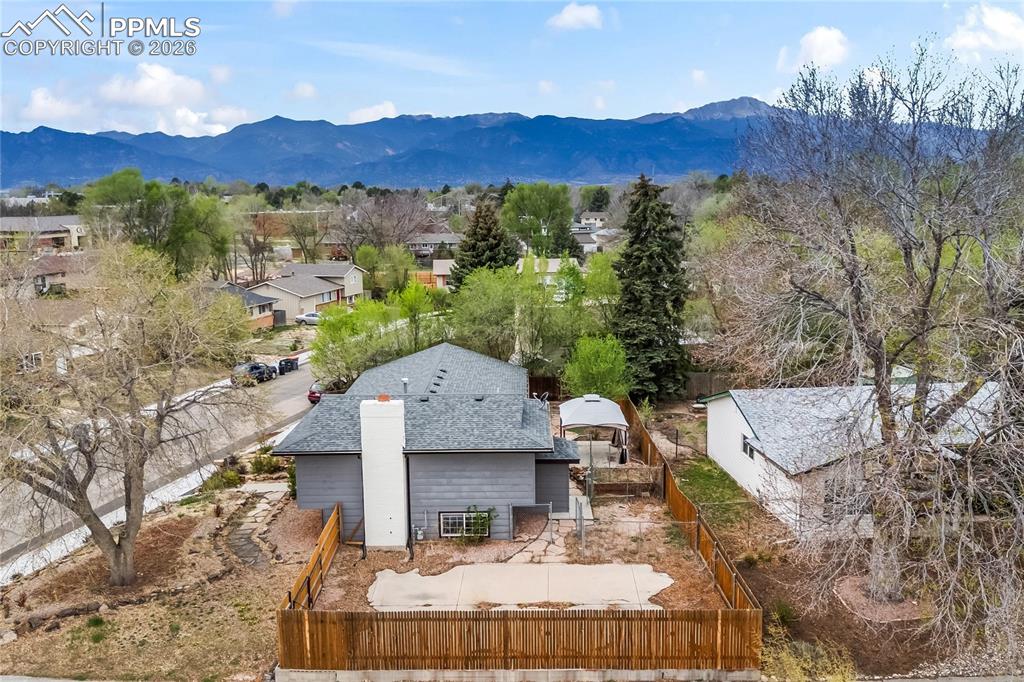 Image 14 of 40: Kitchen and dining room are open to living room