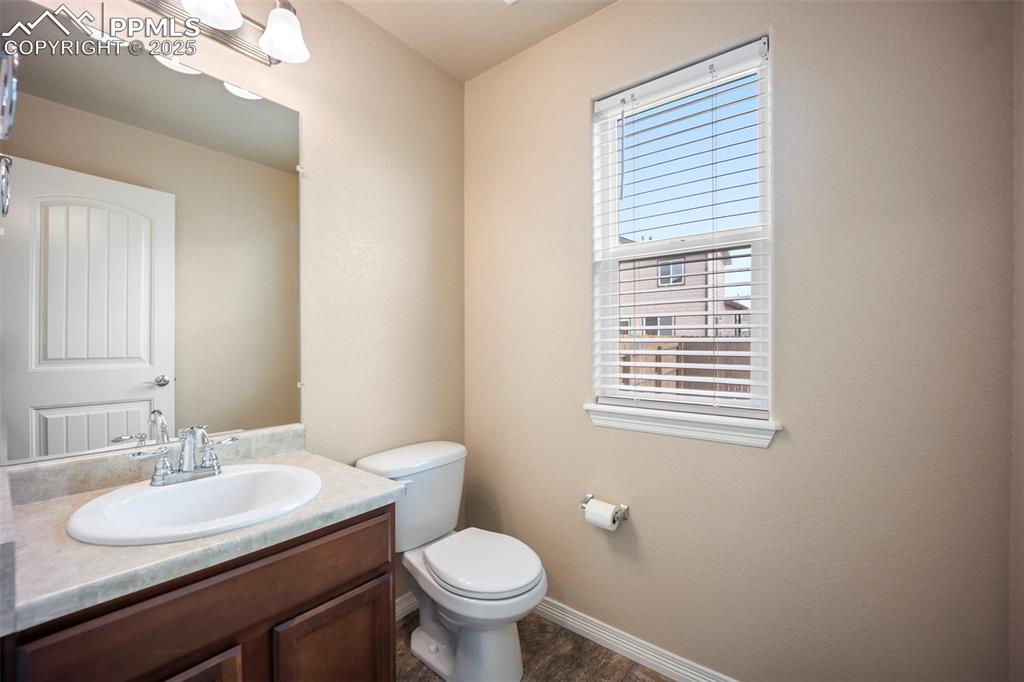 Image 14 of 39: Bathroom featuring vanity and toilet
