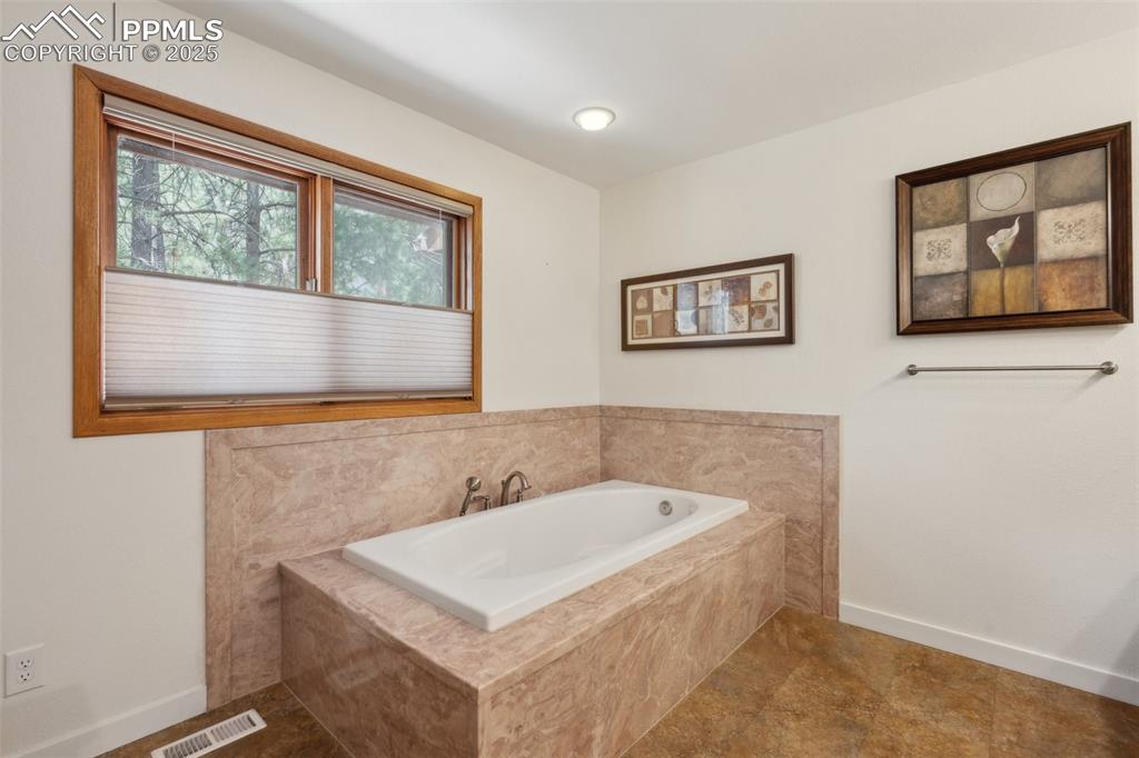 Image 32 of 49: Master Bathroom