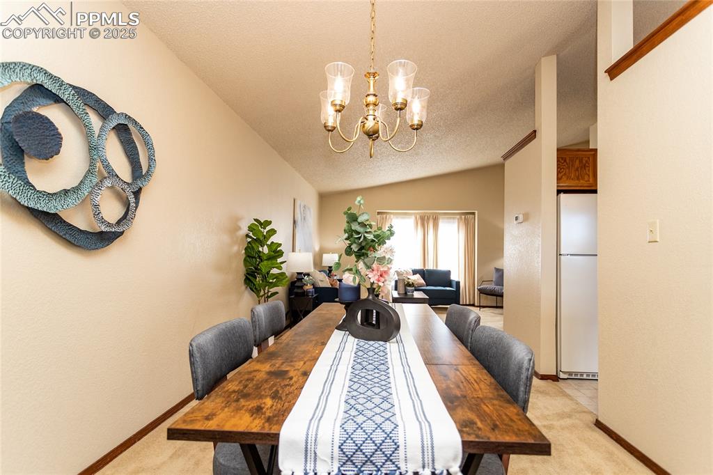 Image 11 of 46: Step back inside and you are a few steps away from the Kitchen.