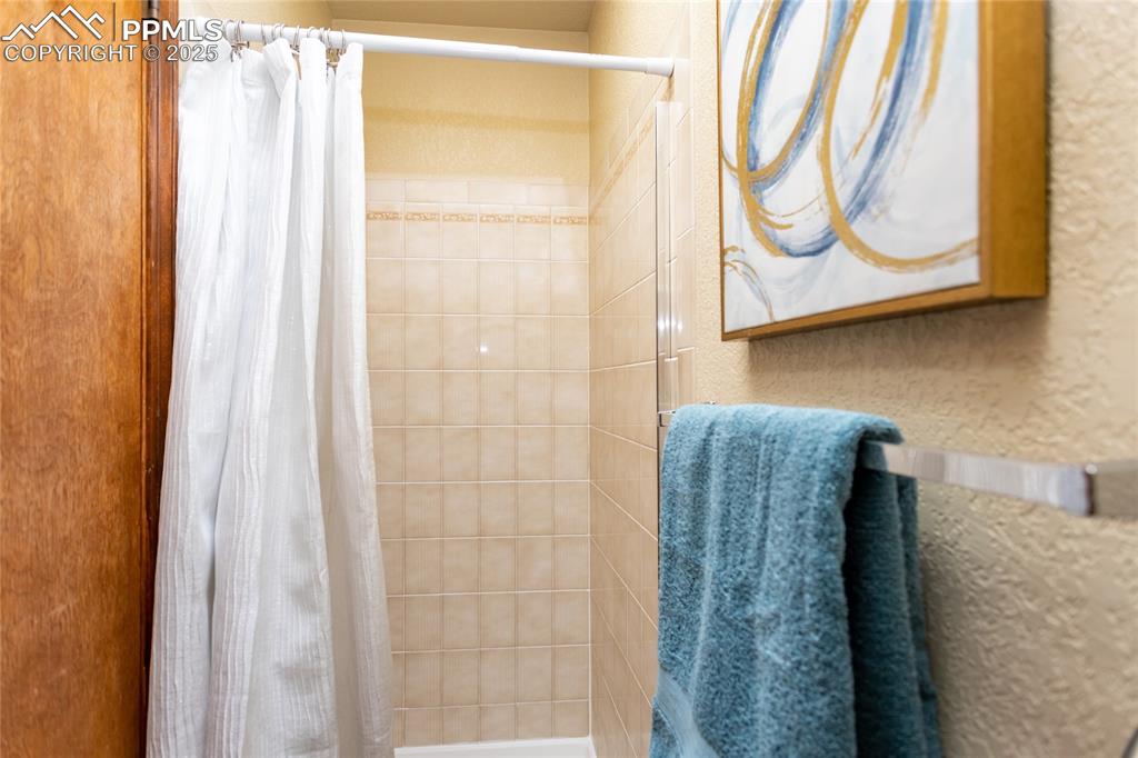 Image 29 of 46: Private toilet and shower in the master bedroom. 