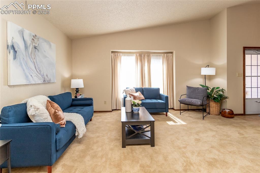 Image 5 of 46: Lots of natural morning light as the living room faces East. 