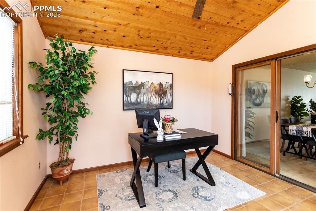 Image 9 of 46: Just off the dining area is the Sunroom.