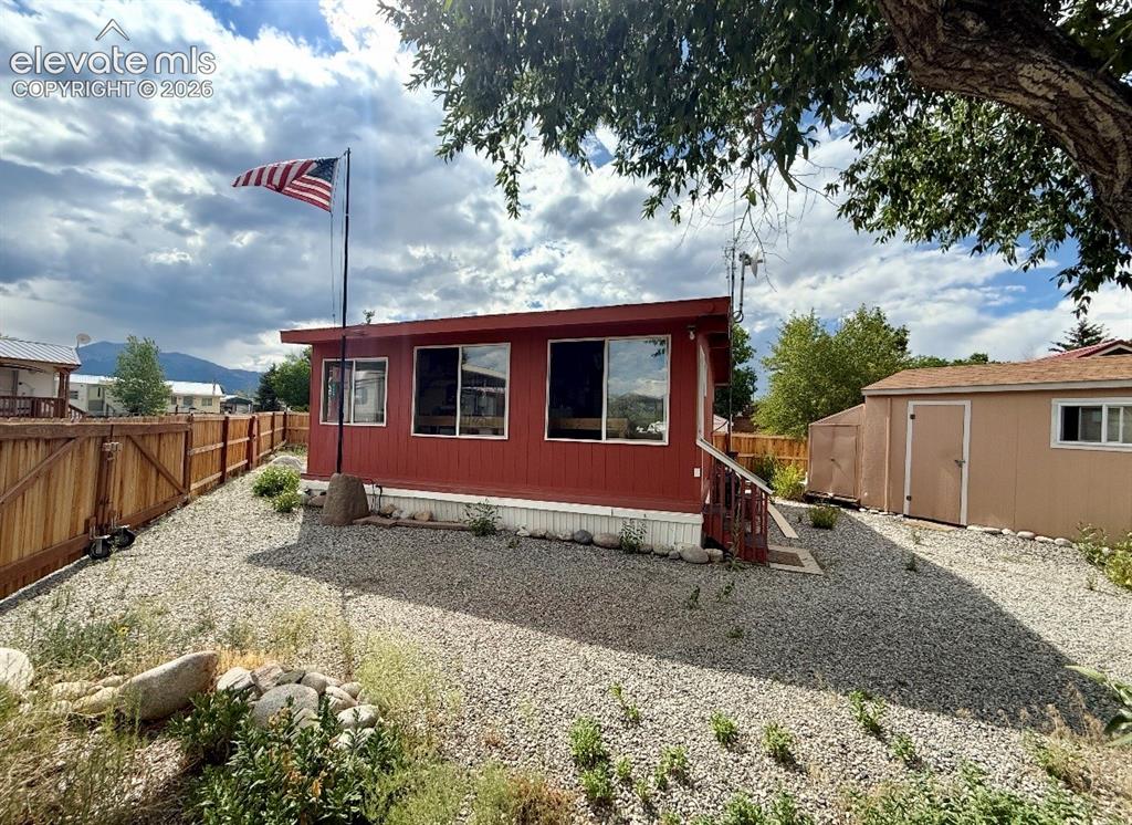 Image 1 of 34: Front of property with fully inclosed front deck