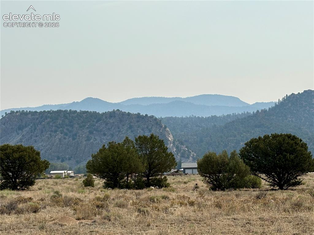 Image 10 of 34: Beautiful mountain views from front porch