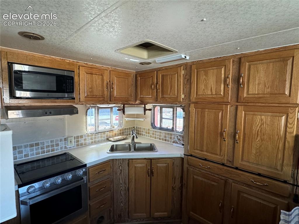 Image 15 of 34: Lots of cabinet space for your kitchen