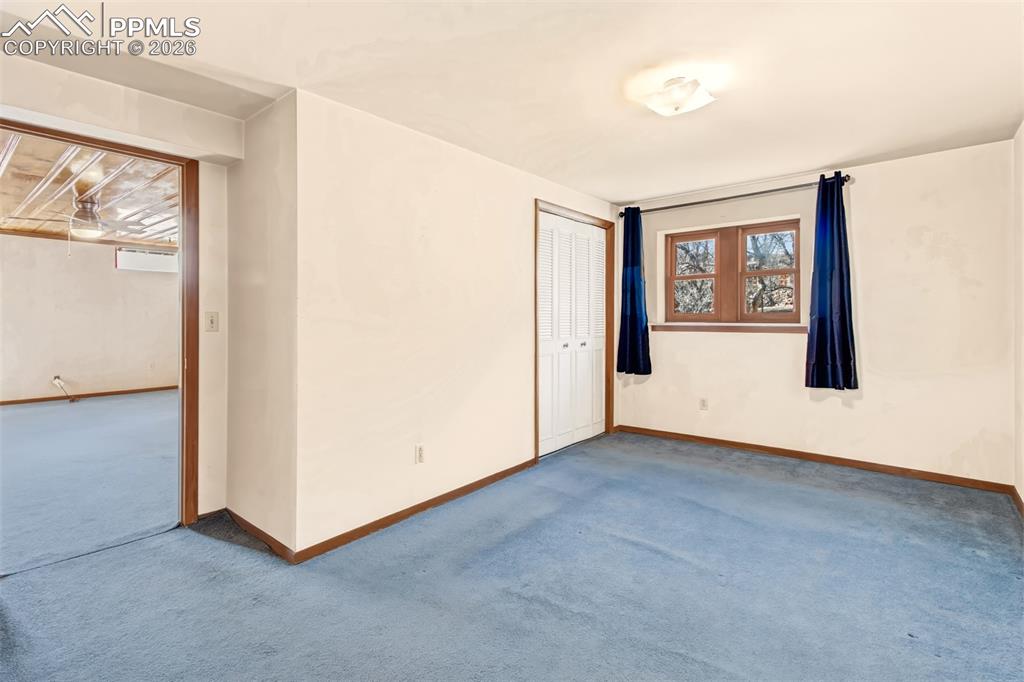 Image 28 of 50: Basement Bedroom