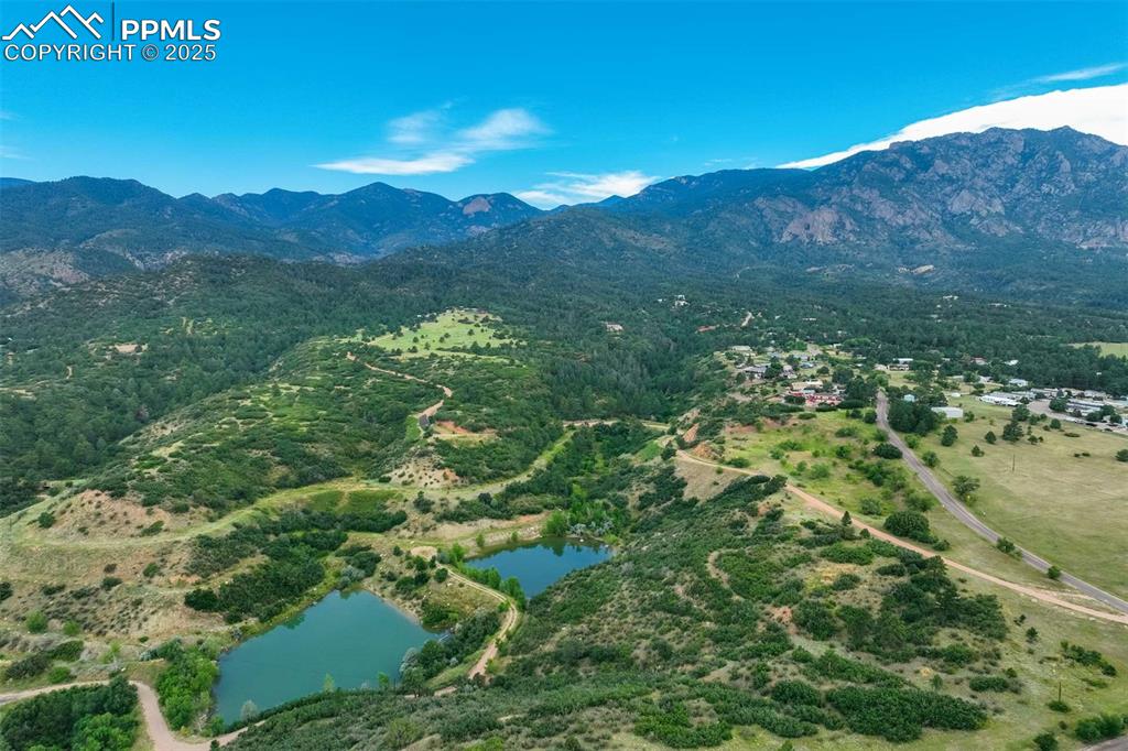 Image 37 of 41: Aerial view of a water and mountain view