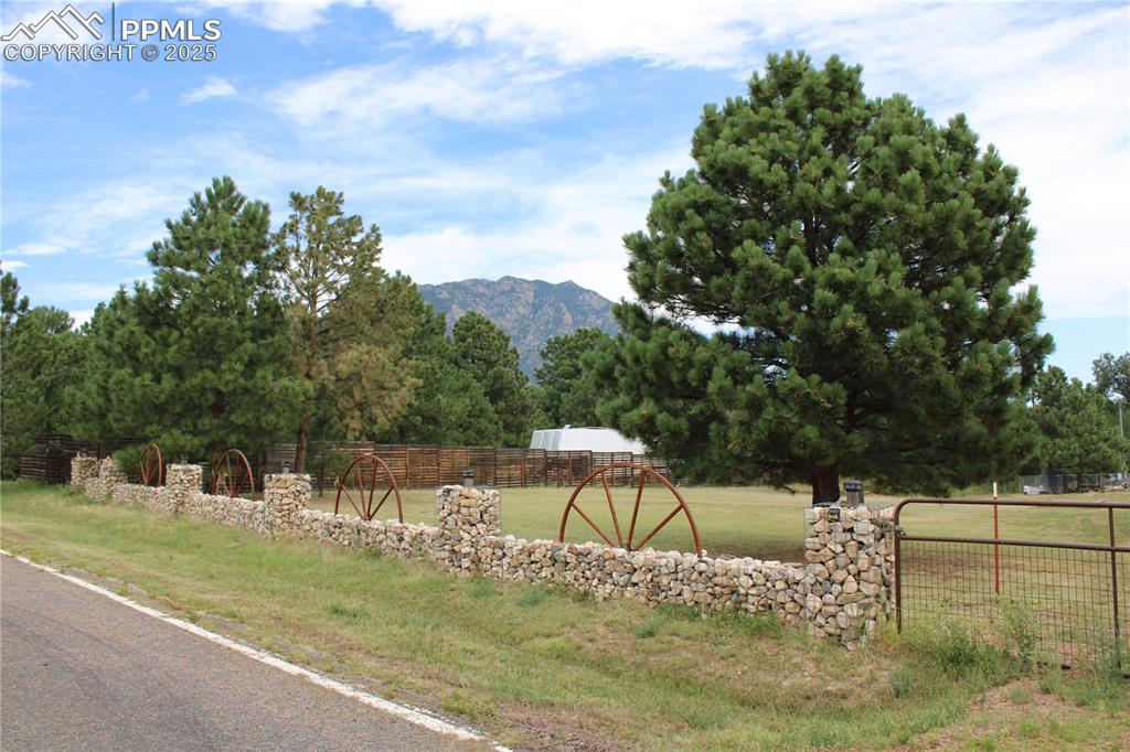 Image 5 of 41: View of yard with a mountain view