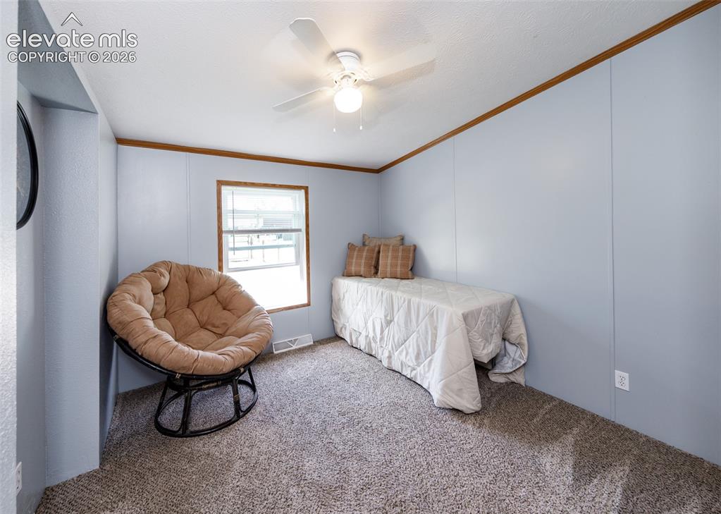 Image 19 of 38: Bedroom