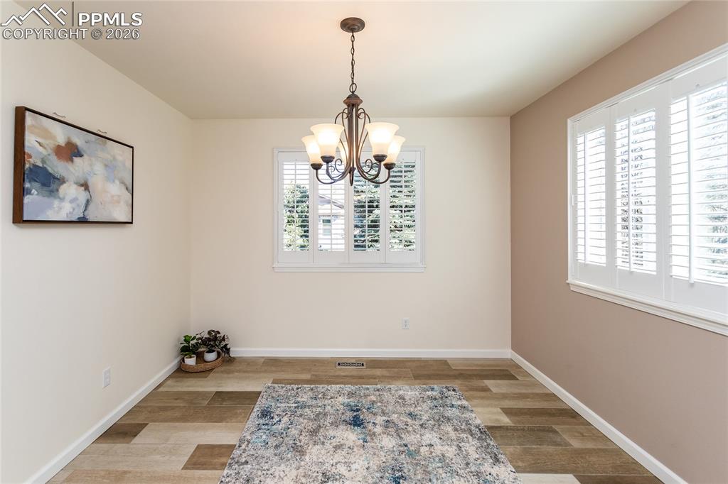 Image 10 of 50: Just off the kitchen for entertaining!