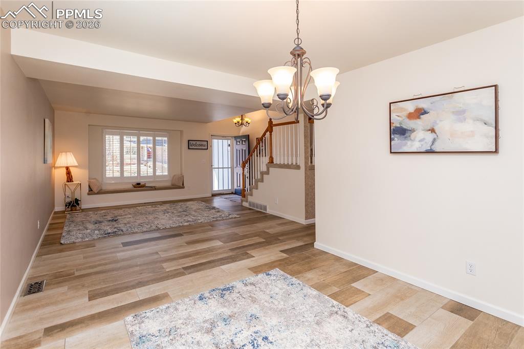 Image 11 of 50: Notice the beautiful porcelain tile floors!