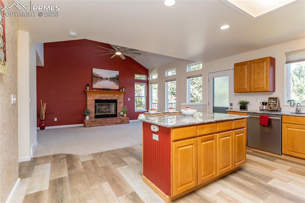 Image 12 of 50: The kitchen is open to the family room