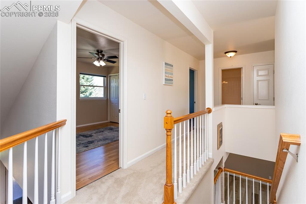 Image 23 of 50: Has a "Juliet" balcony looking in to the family room.