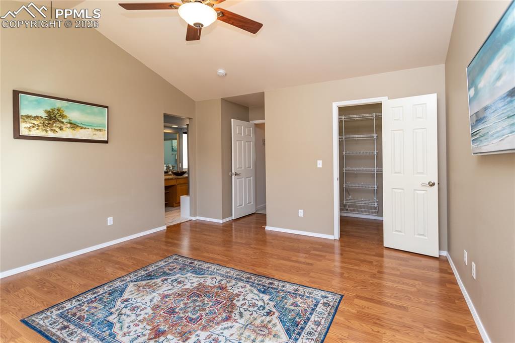 Image 26 of 50: Main bedroom shooting towards the closet, entry, and bathroom entry