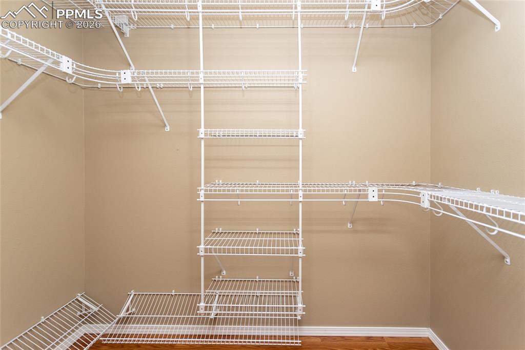 Image 27 of 50: Walk-in closet off Main bedroom