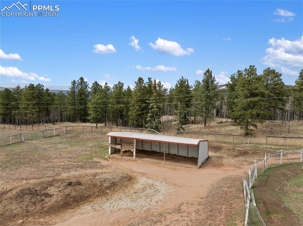Image 15 of 46: Loafing shed in pasture