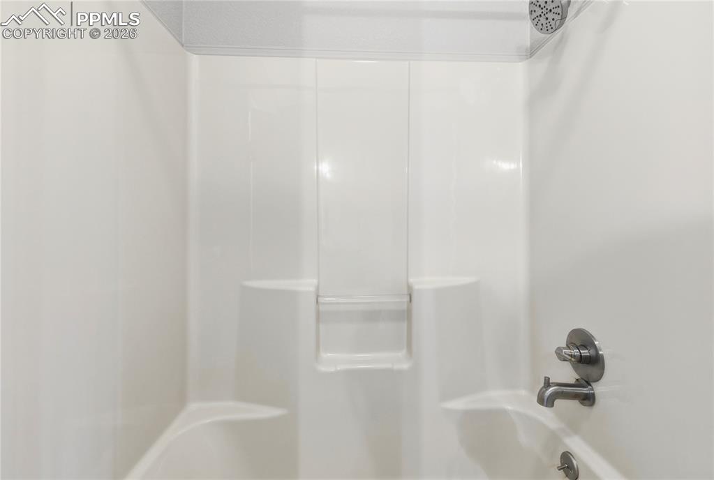 Image 32 of 46: Full bathroom featuring a shower