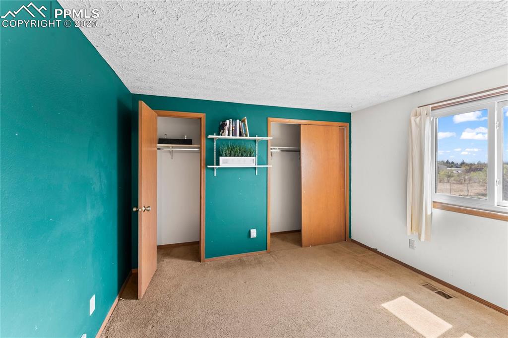 Image 18 of 26: Bedroom