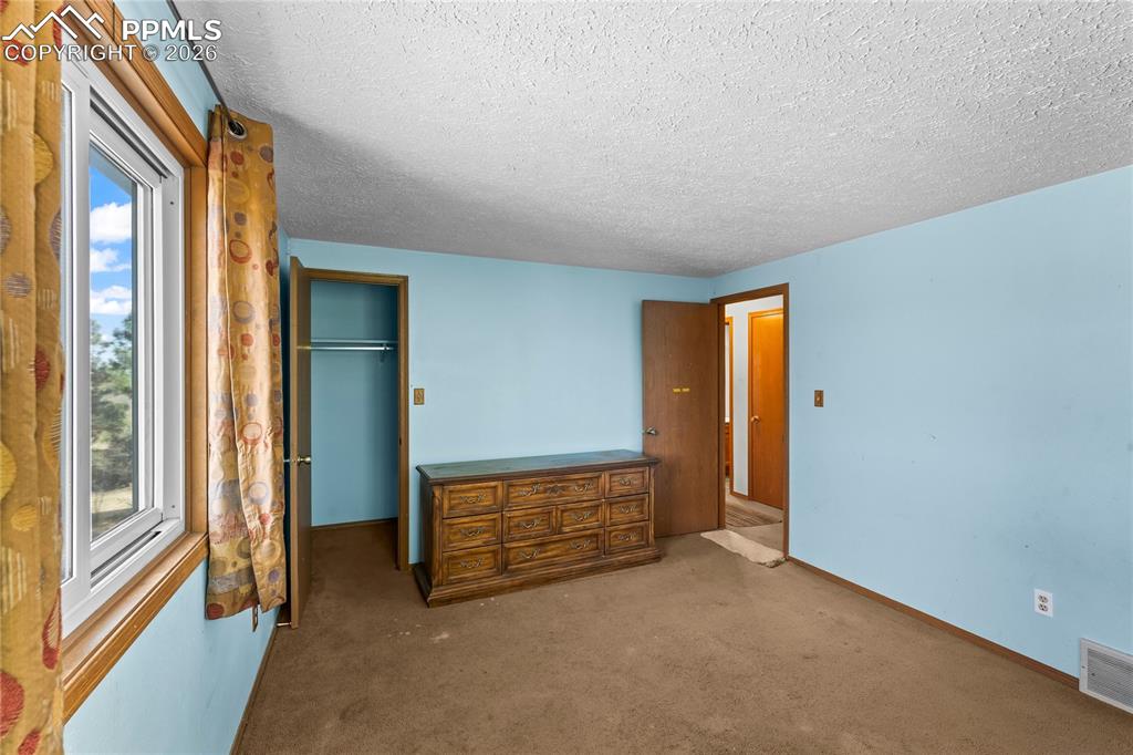 Image 20 of 26: Bedroom