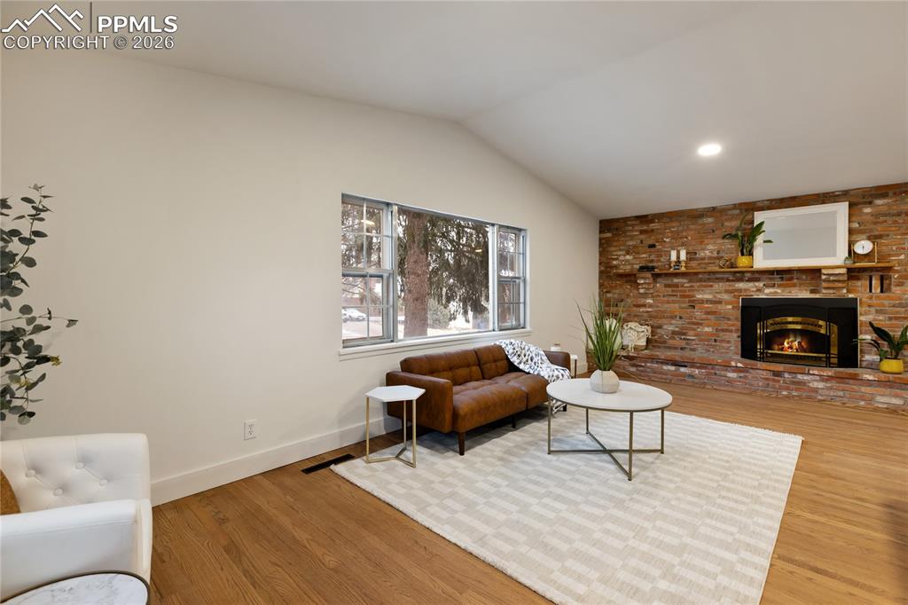 Image 5 of 37: Beautiful living room area is open and bright!  