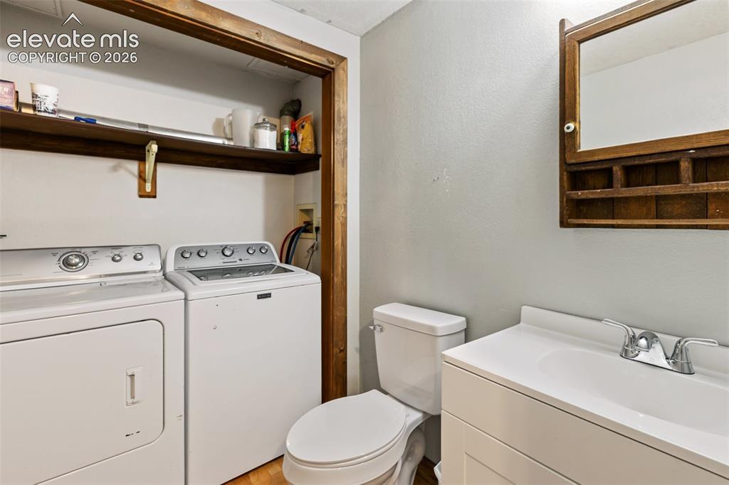 Image 20 of 34: Laundry Space / Full Bath - Basement 