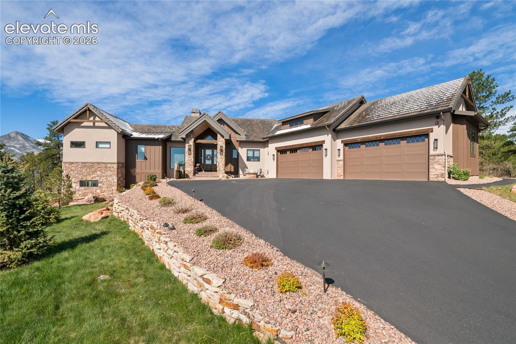Image 1 of 50: The kind of curb appeal that makes you slow down. Aerial front exterior fra
